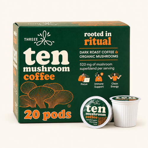 THREEE Ten Mushroom Coffee 20-count dark roast pod box with two coffee pods on a light cream background